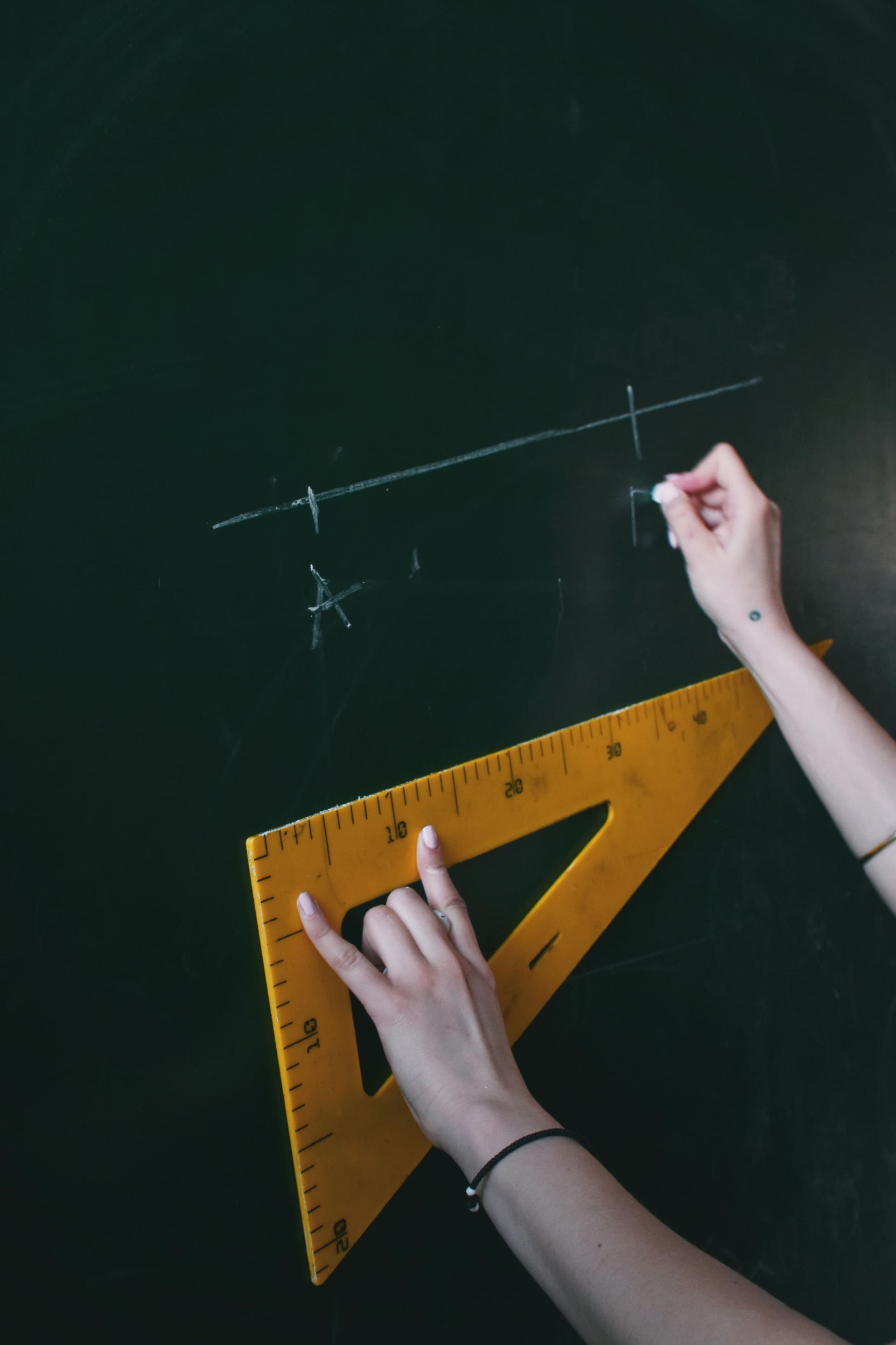 IGCSE student working through exam questions